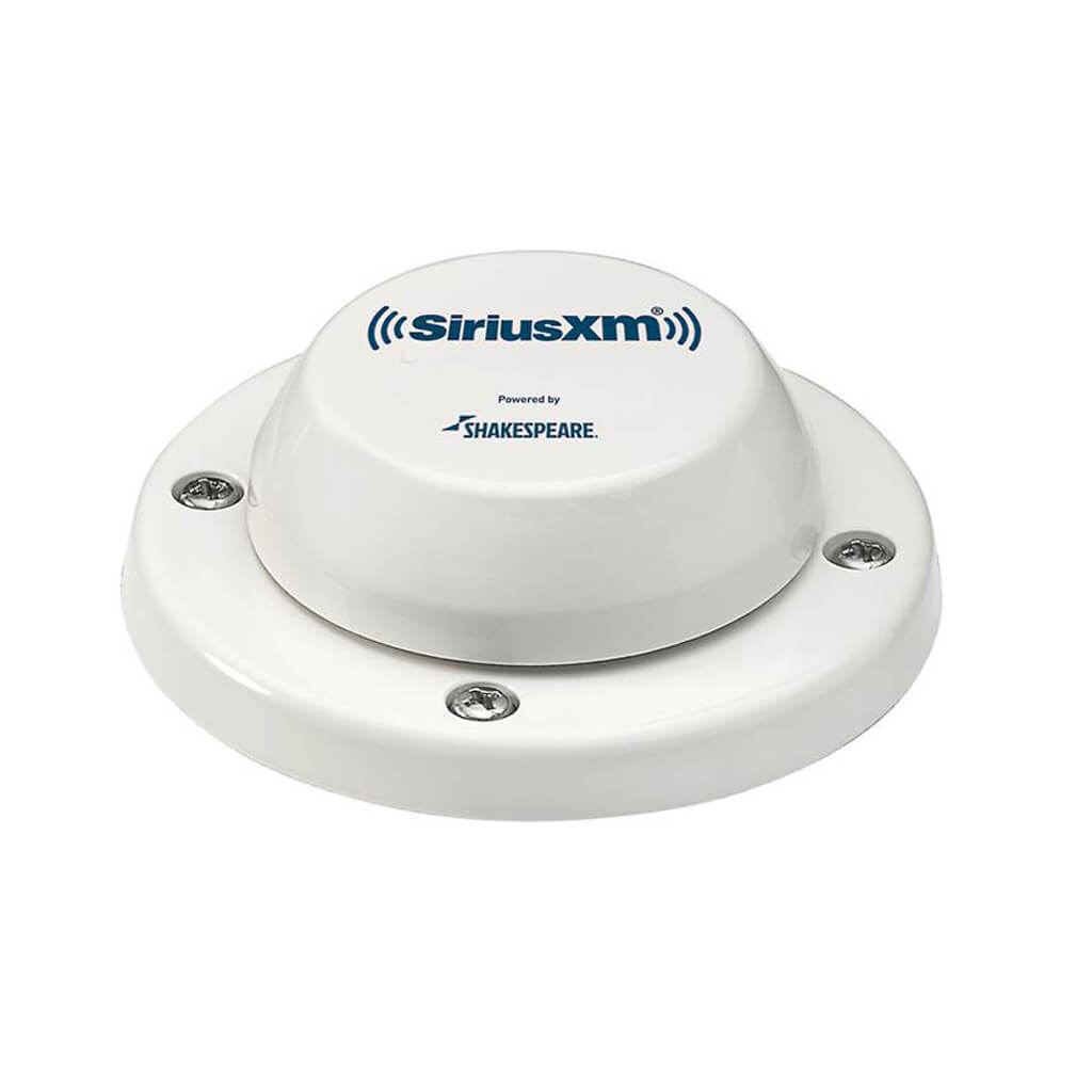 A white SiriusXM marine doe antenna with a circular mounting base, featuring blue printed logos for 'SiriusXM' and 'Shakespeare' on the top dome.